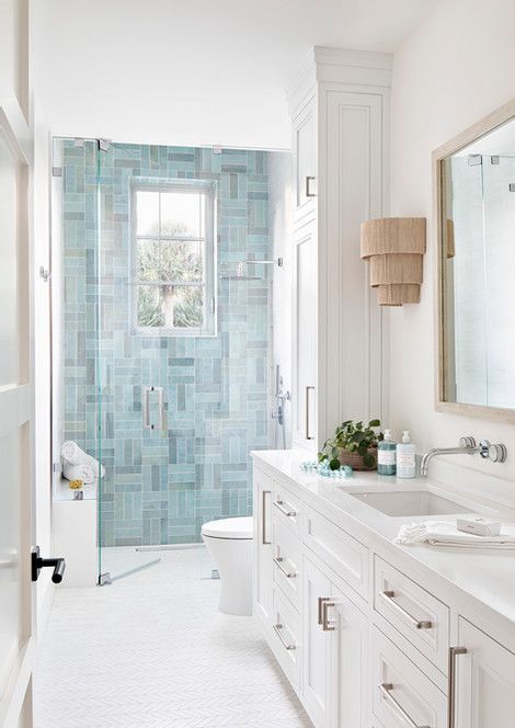 blue tile accent wall in shower