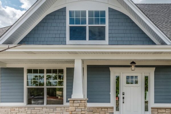 new construction home with blue siding image